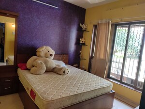 Bedroom in 2 BHK Apartment at Lokhandwala Complex – for Rent