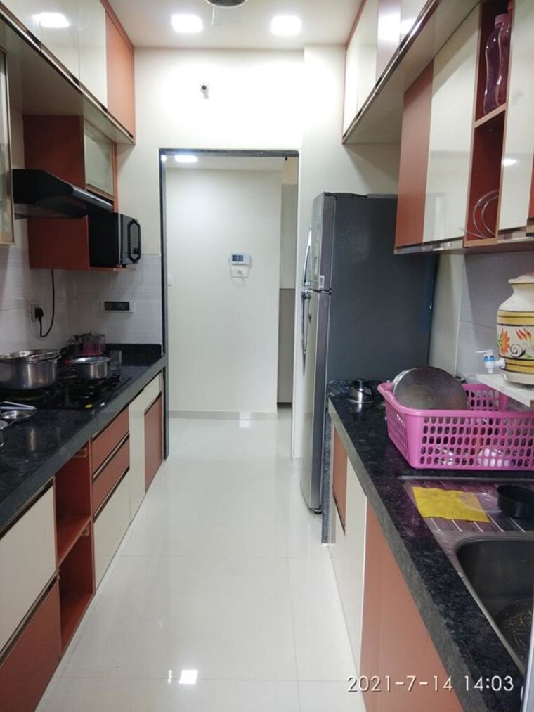Kitchen, rustomjee-azziano-wing-i 2 Bedroom 828 Sq.Ft. Apartment In Thane West Thane 10596625