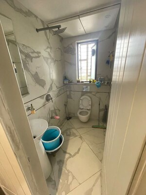 Bathroom in 4 BHK Apartment at Eskay Itus Apartment, Andheri West – for Rent
