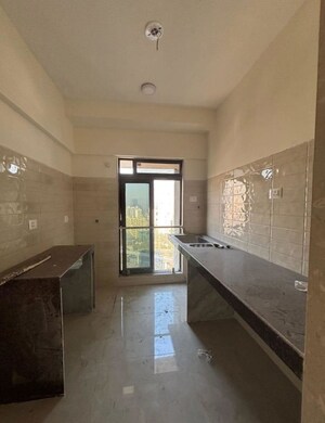 Kitchen in 2 BHK Apartment at IM Applaud 38, Goregaon East – for Rent