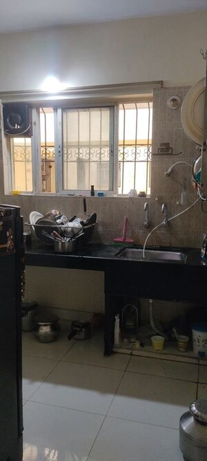 Kitchen in 2 BHK Apartment at Siddhivinayak Ginger, Pimple Saudagar – for Rent