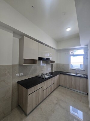 Kitchen in 2 BHK Apartment at Smart World Orchard, Sector 61 – for Rent