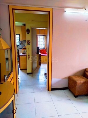 Living Room in 1 BHK Apartment at Rohan Garden, Kothrud – for Rent