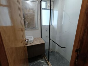 Bathroom in 4 BHK Builder Floor at Sushant Lok I – for Sale