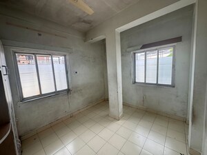 Building Lobby in 1 BHK Apartment at Trimurtee Nagar – for Sale