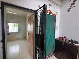 Building Lobby in 1 BHK Apartment at Trimurtee Nagar – for Sale