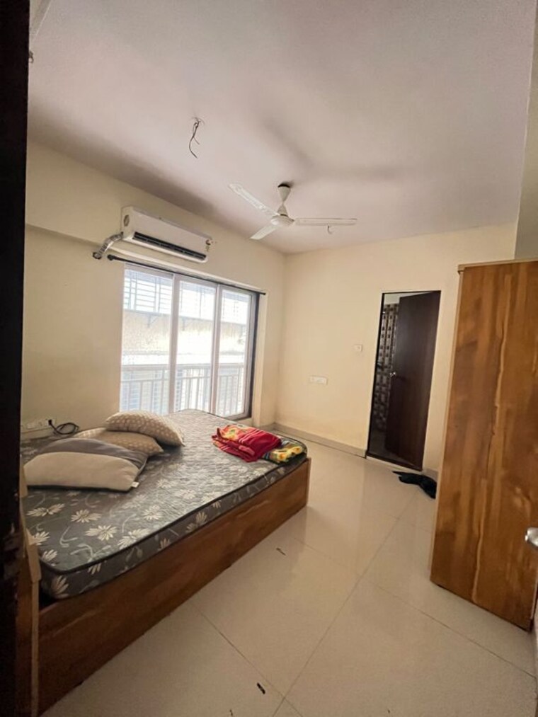 Bedroom, naman-habitat 3 Bedroom 950 Sq.Ft. Apartment In Andheri West Mumbai 10596842