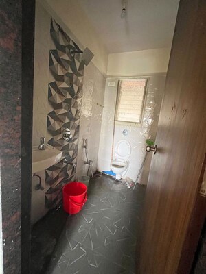 Bathroom in 3 BHK Apartment at Naman Habitat, Andheri West – for Rent