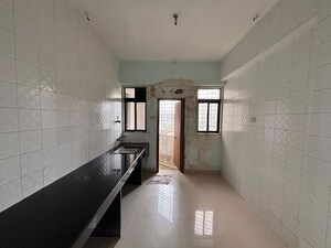 Building Lobby in 3 BHK Apartment at Meera Tower, Andheri West – for Sale