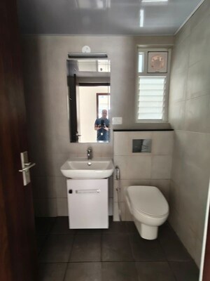 Bathroom in 2 BHK Apartment at Adarsh Greens, Kogilu – for Rent