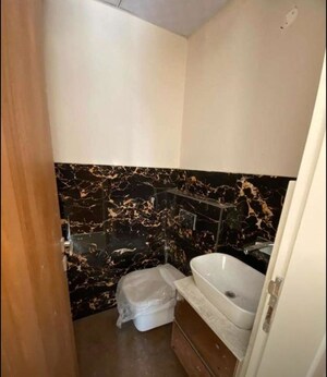Bathroom in 3 BHK Apartment at The Ananta Aspire, Utrathiya – for Rent