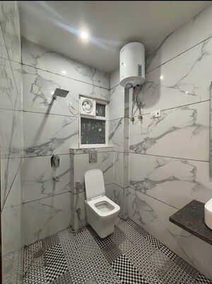 Bathroom in 2 BHK Builder Floor at Chattarpur – for Rent
