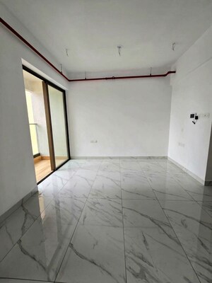 Bathroom in 2 BHK Apartment at Raymond Ten X Habitat, Pokhran Road No Two – for Rent