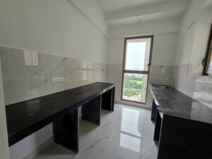 Kitchen in 2 BHK Apartment at Raymond Ten X Habitat, Pokhran Road No Two – for Rent
