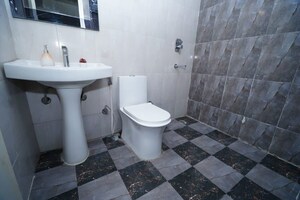 Bathroom in 3 BHK Apartment at Migsun Twiinz, Eta Ii Greater Noida – for Sale