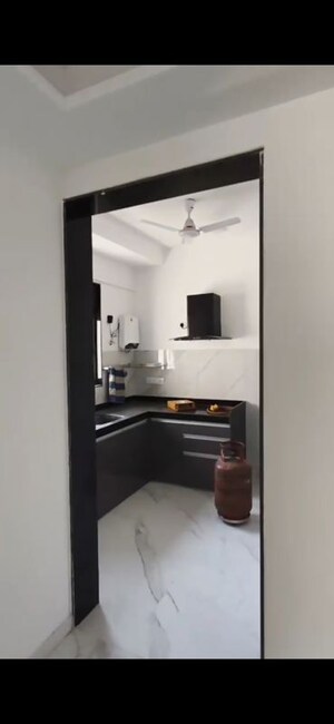 Kitchen in 2 BHK Apartment at Dev Leo Tower, Oshiwara – for Rent
