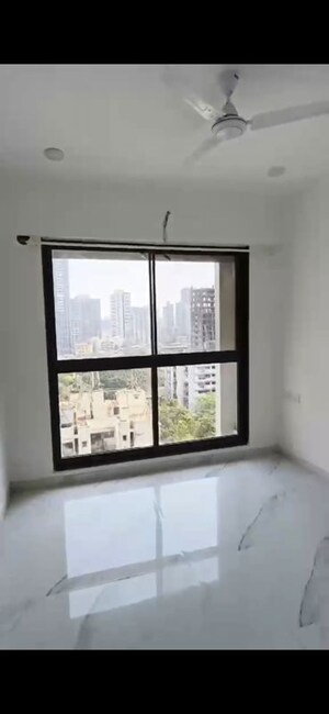 Room in 2 BHK Apartment at Dev Leo Tower, Oshiwara – for Rent