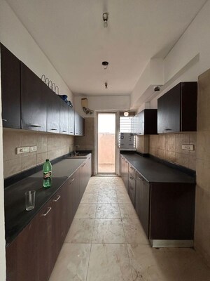 Kitchen in 3 BHK Apartment at Puri Pranayam, Sector 82 – for Rent