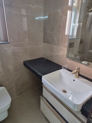 Bathroom in 3 BHK Apartment at Smart World Orchard, Sector 61 – for Rent