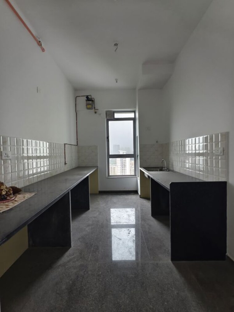 Kitchen, kalpataru-immensa 3 Bedroom 1153 Sq.Ft. Apartment In Kolshet Road Thane 10597298