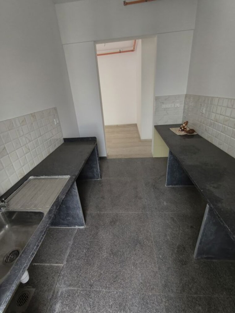 Kitchen, kalpataru-immensa 3 Bedroom 1153 Sq.Ft. Apartment In Kolshet Road Thane 10597298