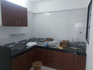 Kitchen in 2 BHK Apartment at Vardhaman Moonstone, Tathawade – for Rent