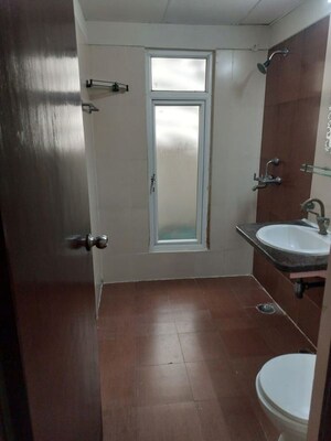 Bathroom in 2.5 BHK Apartment at Mahagun Moderne, Sector 78 – for Rent