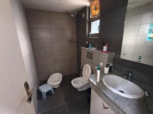 Bathroom in 4 BHK Apartment at Paras Dews, Sector 106 – for Sale