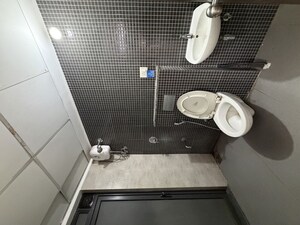 Bathroom in 1 BHK Apartment at Lodha Palava Downtown, Dombivli East – for Rent
