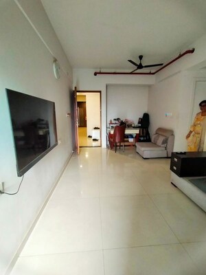 Living Room in 2 BHK Apartment at Rustomjee Azziano Wing I, Thane West – for Rent