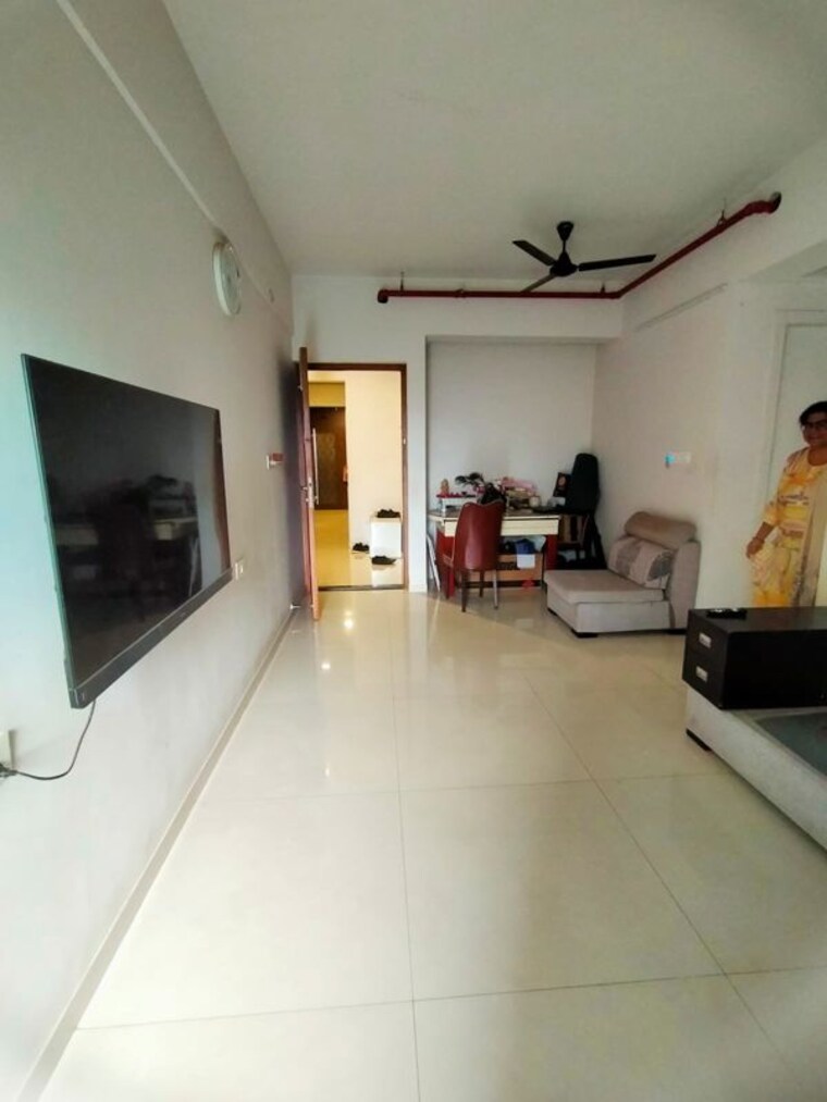 Living Room, rustomjee-azziano-wing-i 2 Bedroom 914 Sq.Ft. Apartment In Thane West Thane 10597525
