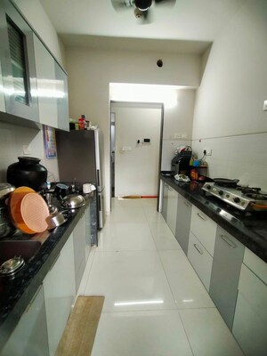 Kitchen in 2 BHK Apartment at Rustomjee Azziano Wing I, Thane West – for Rent