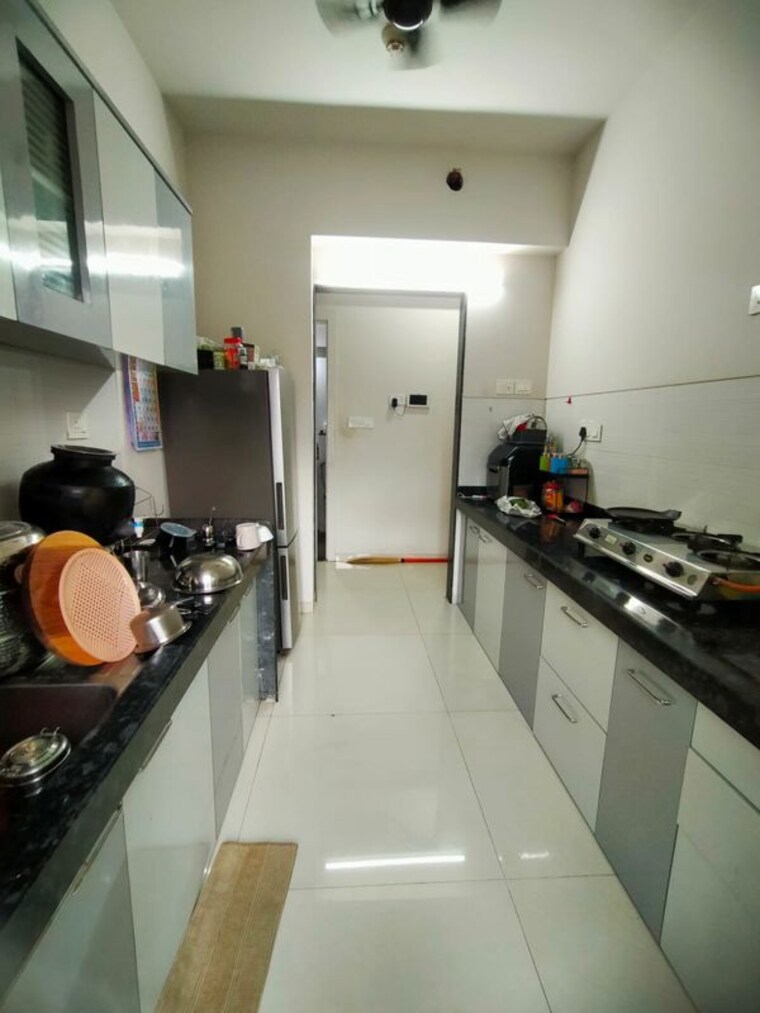 Kitchen, rustomjee-azziano-wing-i 2 Bedroom 914 Sq.Ft. Apartment In Thane West Thane 10597525