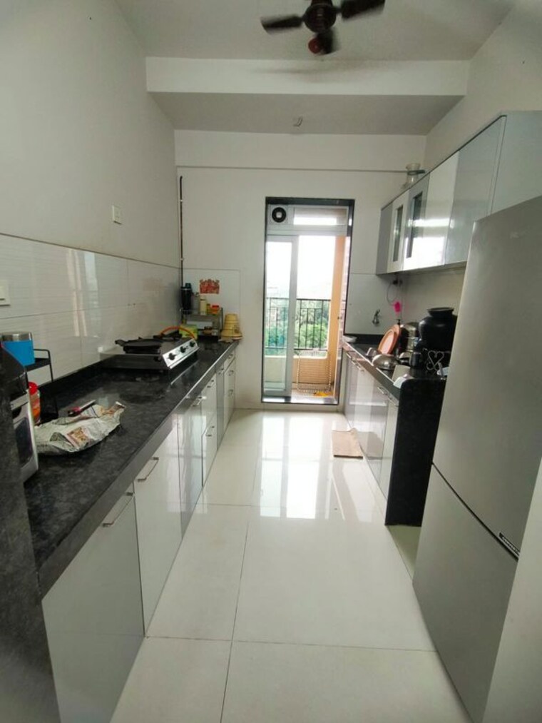 Kitchen, rustomjee-azziano-wing-i 2 Bedroom 914 Sq.Ft. Apartment In Thane West Thane 10597525