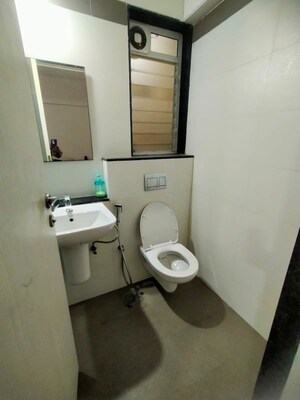 Bathroom in 2 BHK Apartment at Rustomjee Azziano Wing I, Thane West – for Rent