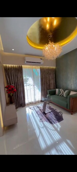 Living Room in 2 BHK Apartment at Raunak Unnathi Woods Supreme, Ghodbunder Road – for Sale