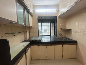 Kitchen in 2 BHK Apartment at OM Elegance, Malad West – for Rent