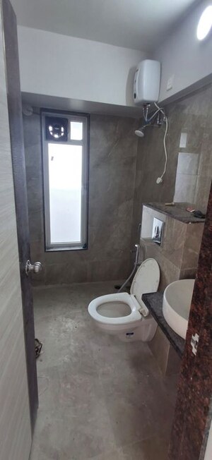 Bathroom in 2 BHK Apartment at Akshar Green World, Dighe – for Rent