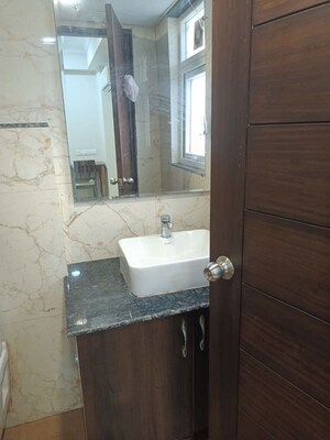 Bathroom in 1 BHK Apartment at Sushant Lok I – for Rent