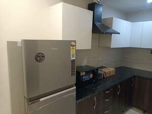 Kitchen in 1 BHK Apartment at Sushant Lok I – for Rent