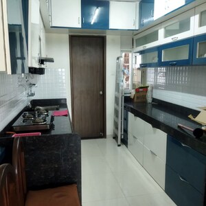 Kitchen in 2.5 BHK Apartment at Sai Garden CHS, Pimple Saudagar – for Rent