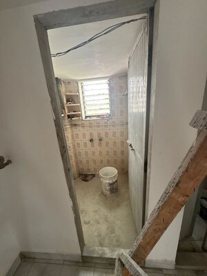 Bathroom in 2 BHK Apartment at Naupada – for Sale