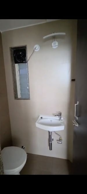 Bathroom in 1 BHK Apartment at Group Satellite Aarambh, Malad East – for Rent
