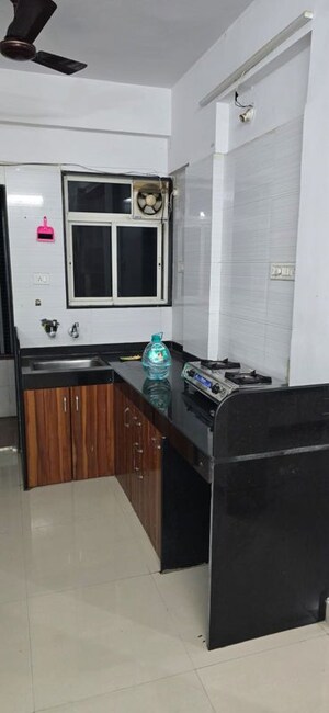 Kitchen in 2 BHK Apartment at SSD Sai Platinum, Pimple Saudagar – for Rent