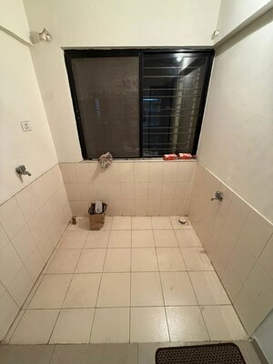 Bathroom in 2 BHK Apartment at Magarpatta City Cosmos, Magarpatta Road – for Rent