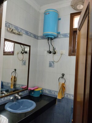 Bathroom in 3 BHK Builder Floor at Kalkaji – for Rent