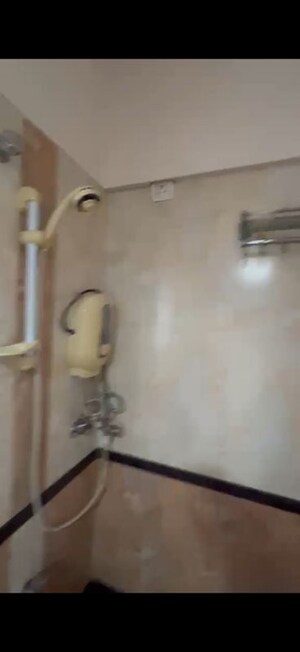 Bathroom in 2 BHK Apartment at Goyal Green Woods, Andheri East – for Rent