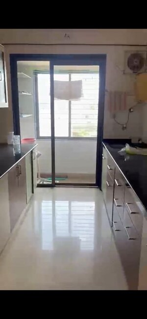 Kitchen in 2 BHK Apartment at Goyal Green Woods, Andheri East – for Rent