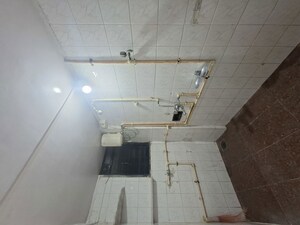 Bathroom in 1 BHK Apartment at Panchayatan CHS, Borivali West – for Rent