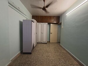 Bedroom in 1 BHK Apartment at Panchayatan CHS, Borivali West – for Rent